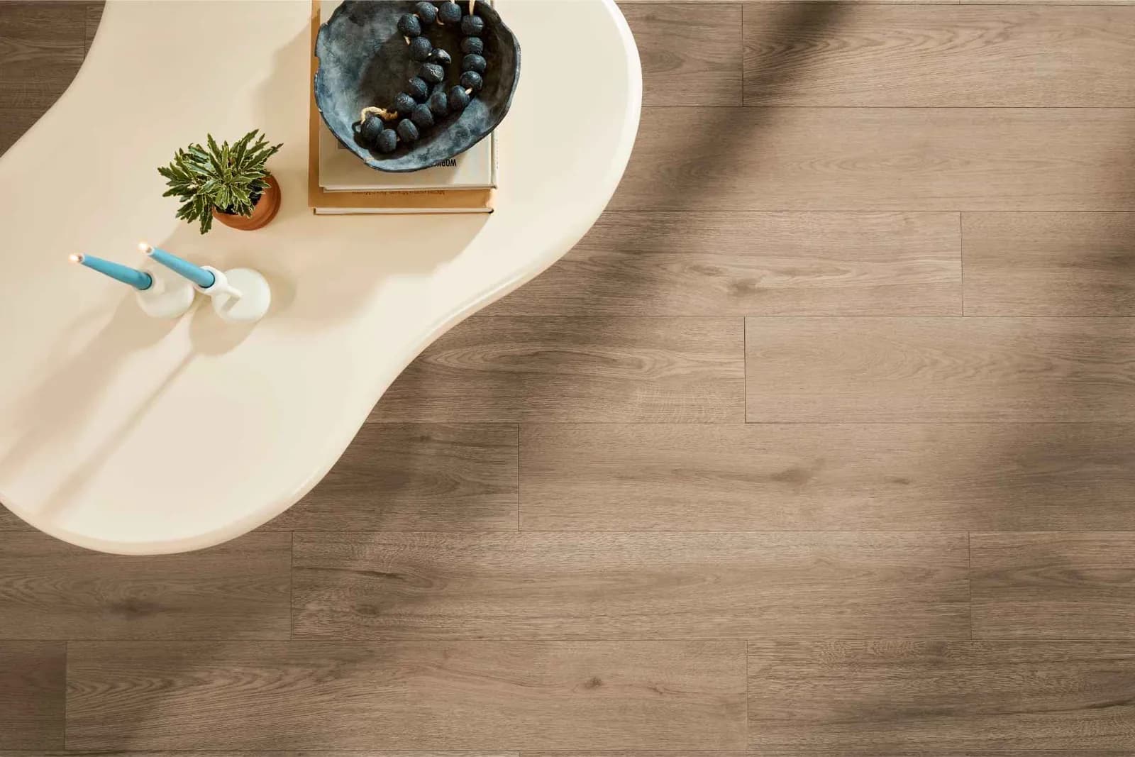 Close-up of wood-grain luxury vinyl plank texture