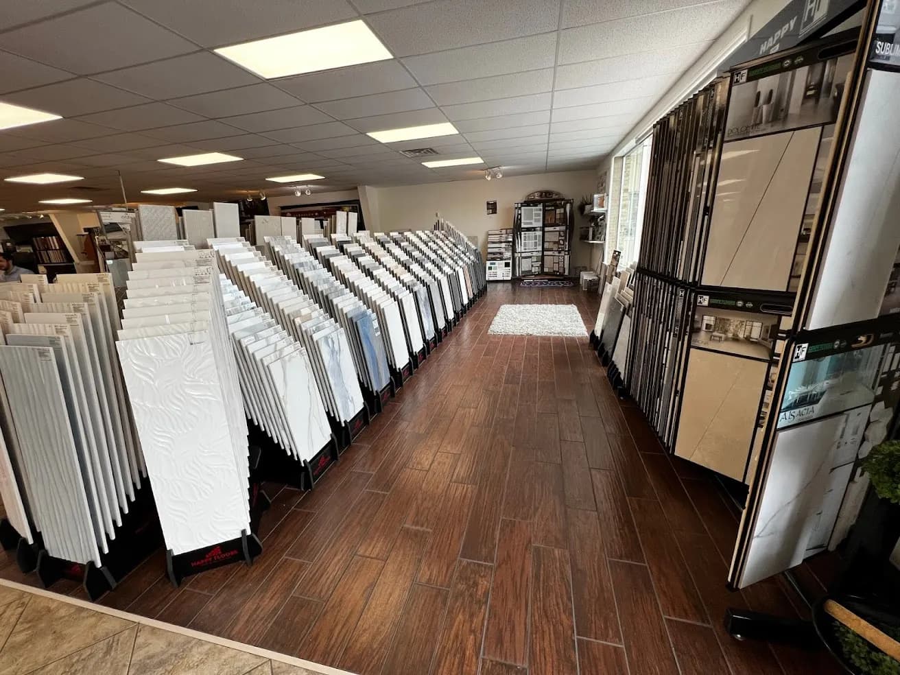 Tile and flooring sample racks inside the Blackburn's Interiors showroom in Winter Haven, FL