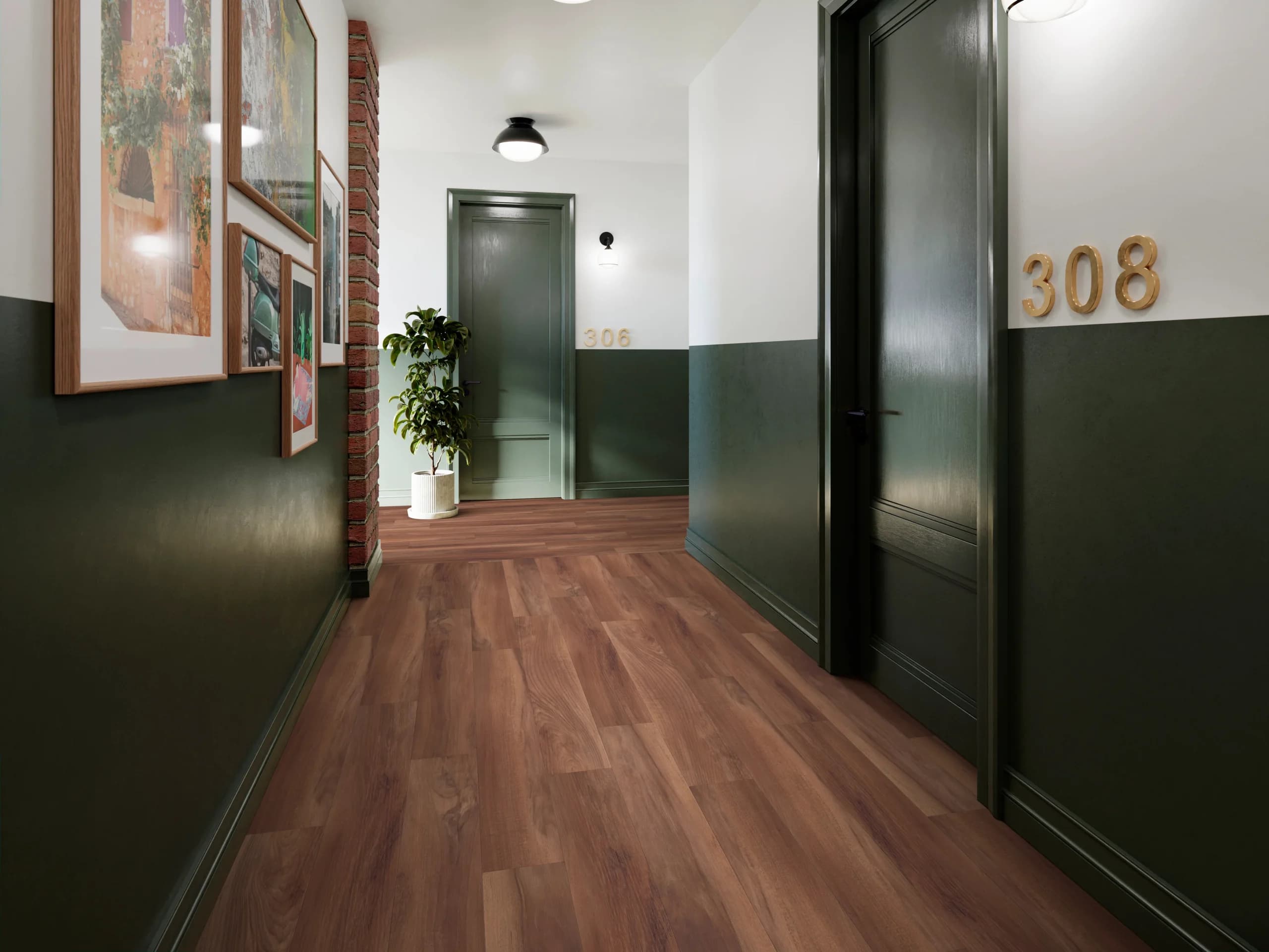 Commercial office hallway with dark wood-look luxury vinyl plank flooring and sage green walls