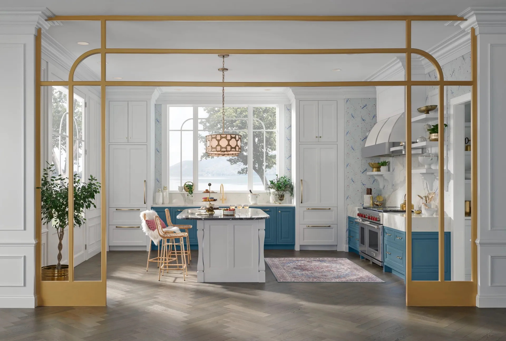 A white and blue kitchen with an island, from the Medallion cabinet line we carry
