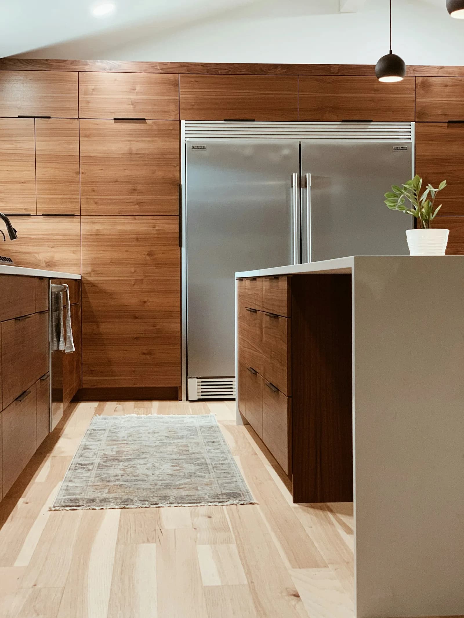 Blackburn's Interiors can you put a refrigerator on vinyl plank flooring blog photo (can-you-put-a-refrigerator-on-vinyl-plank-flooring-hero)