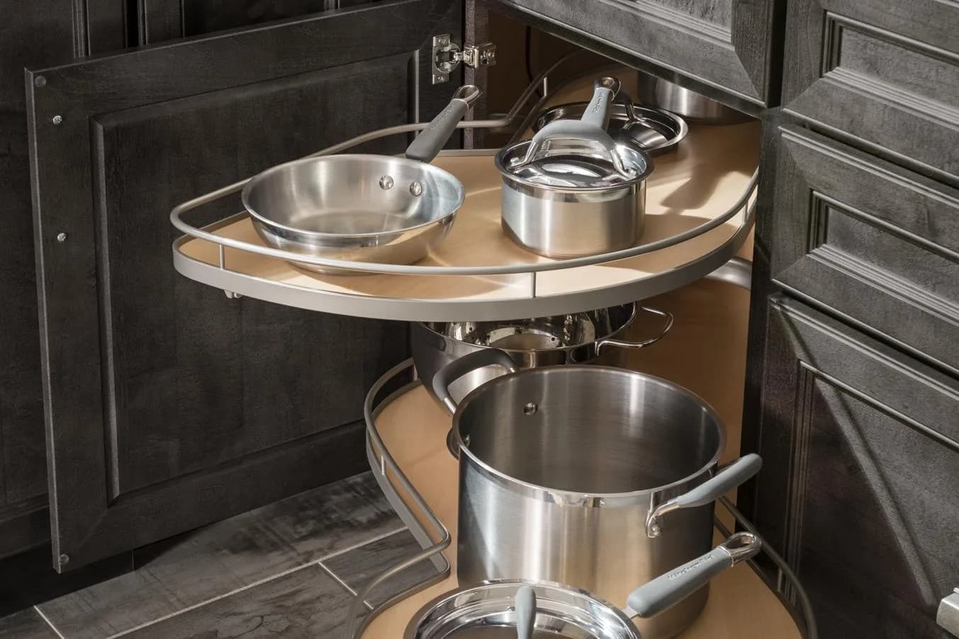 A Medallion blind-corner pull-out swung open, bringing pots from the dead corner out into the kitchen, from the cabinet line we carry