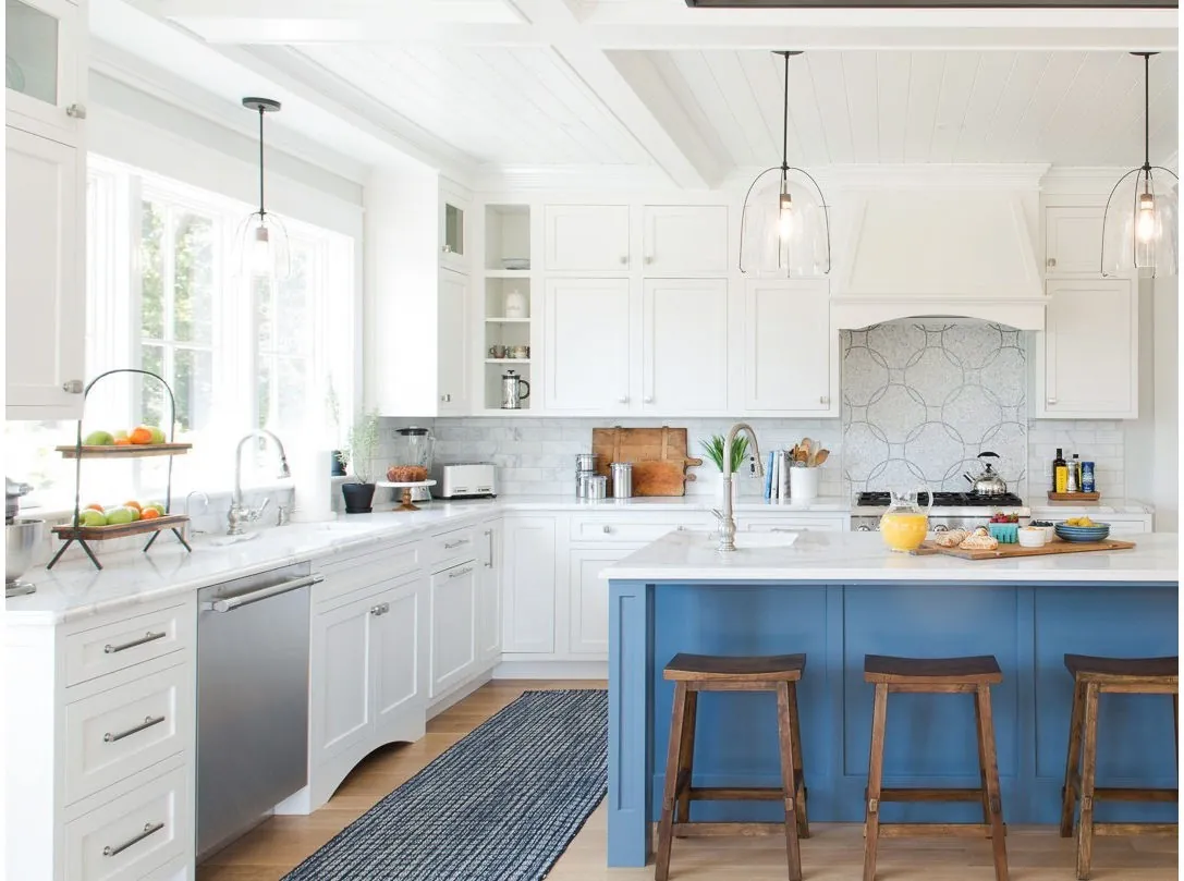 A kitchen with a quartz island, from the Cambria quartz line we carry