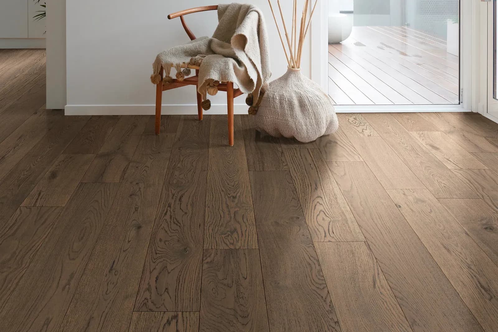 Medium-brown Shaw hardwood flooring, product SW753, in a hallway