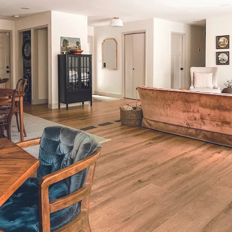 Light wood-look luxury vinyl flooring by Karndean, Baltic Limed Oak, in a real living room featured on Karndean's site