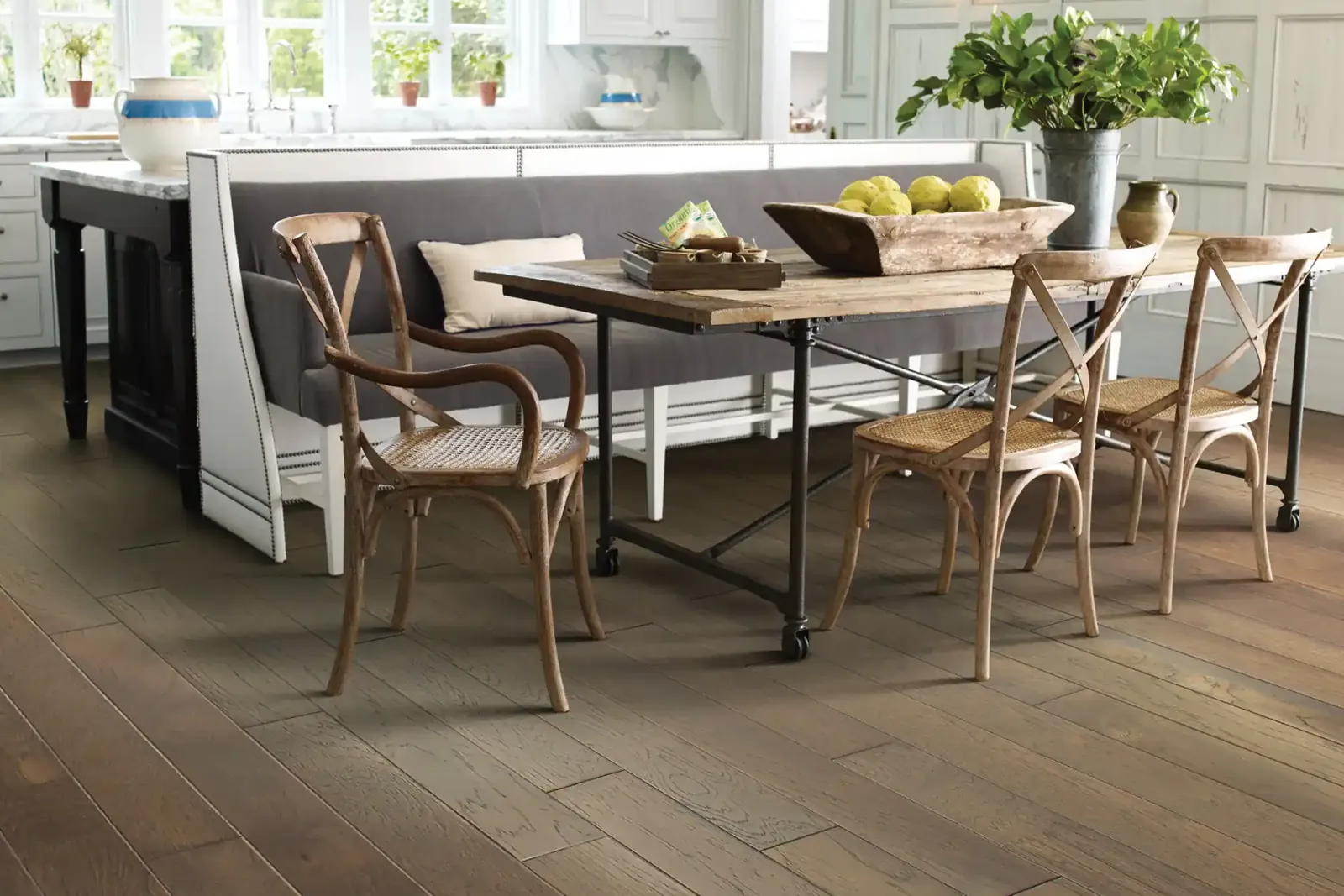Hickory hardwood floor under a farmhouse dining table, durable enough for busy homes