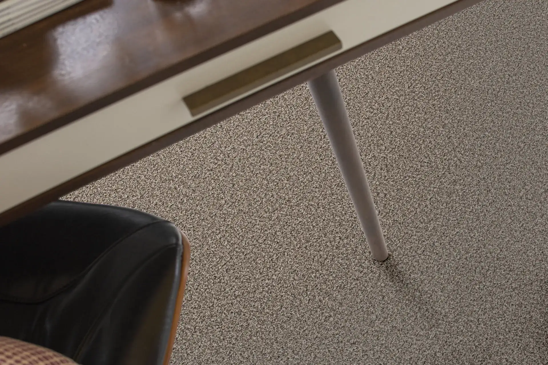 Shaw Ramped Up textured carpet in a natural stone tone in a room setting