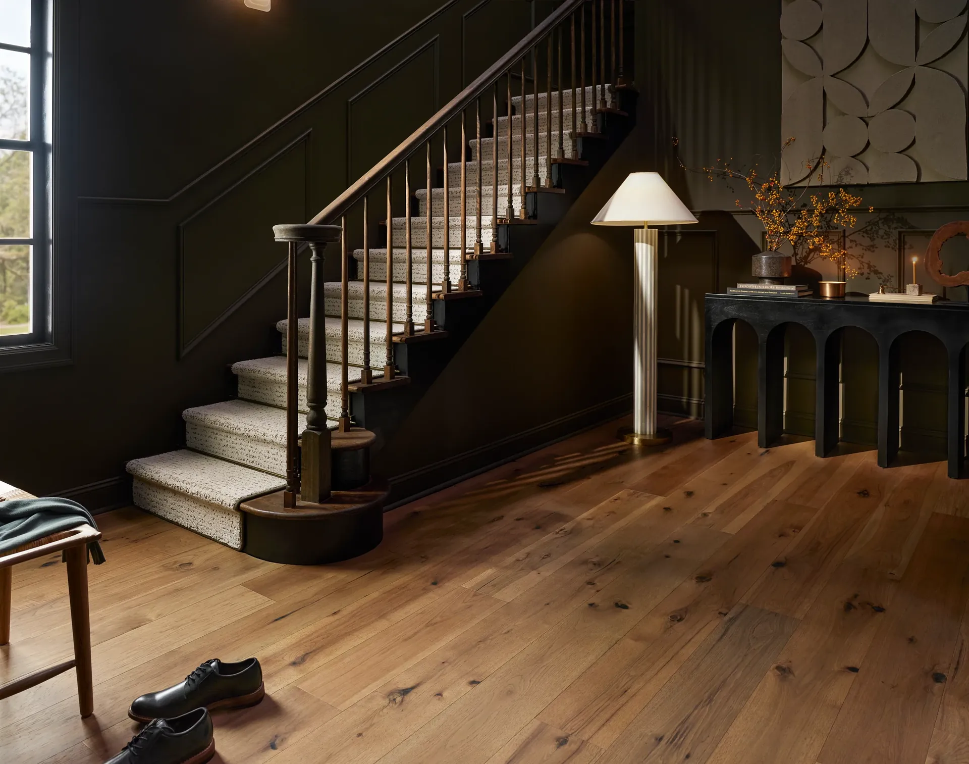 Anderson Tuftex Transcendence hardwood flooring, Absolute color, in a home entryway and staircase