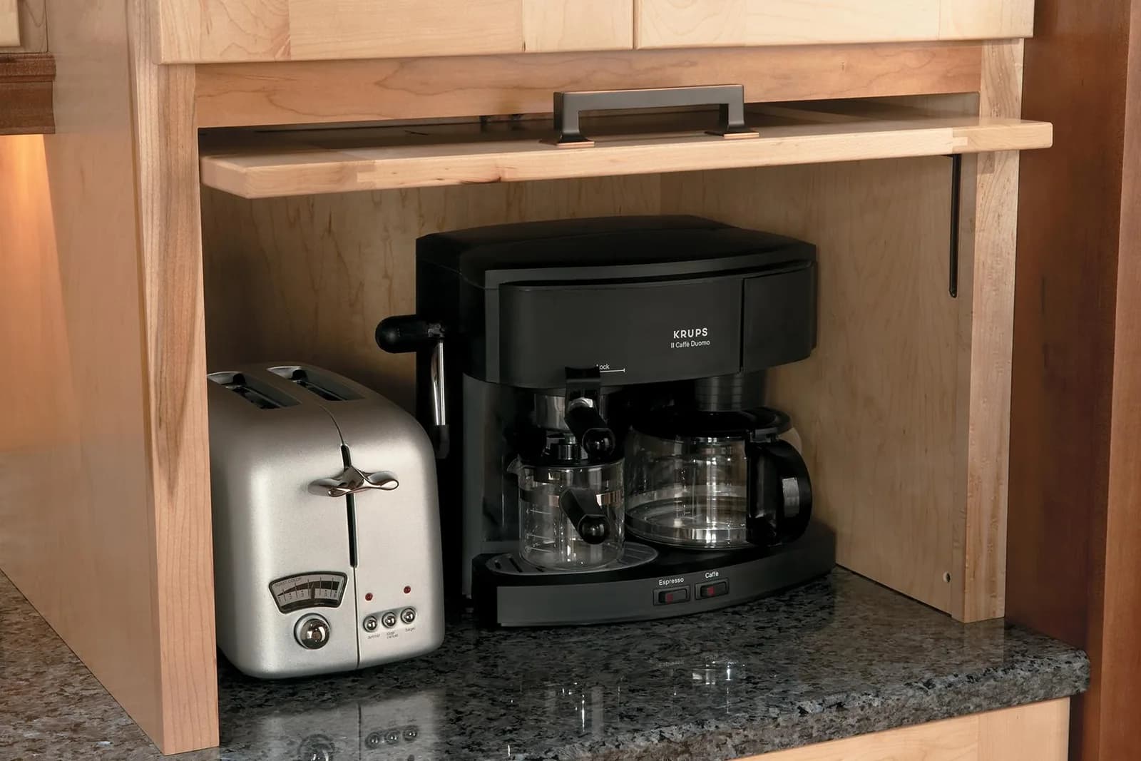 A Medallion appliance garage with the lift-up door open, coffee maker and toaster ready on the counter