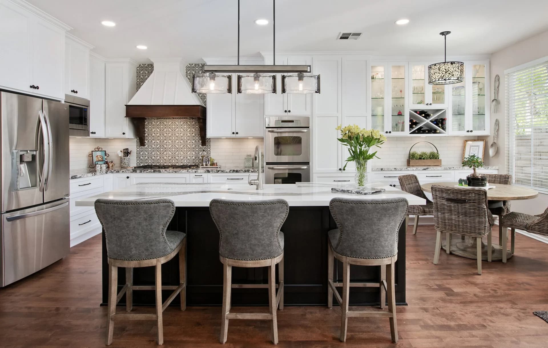 Cambria Skara Brae and Huntley quartz countertops in a family kitchen, from the Cambria line we carry