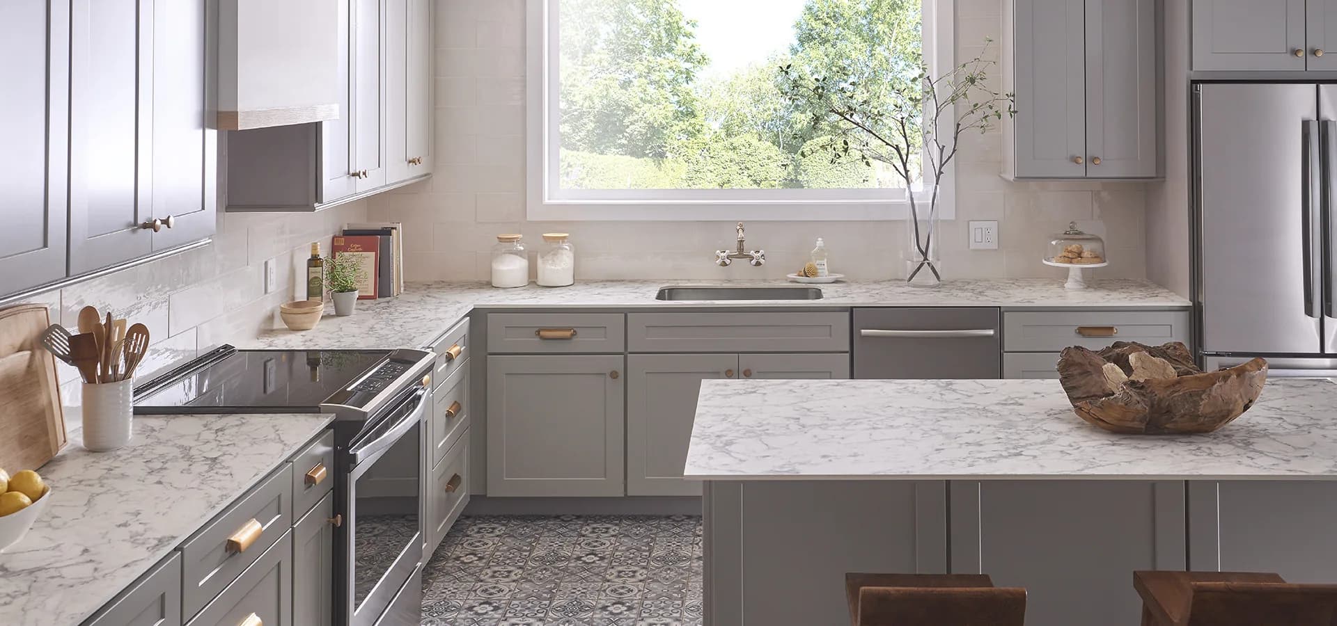 Wilsonart countertops in a gray shaker kitchen, from the Wilsonart line we carry