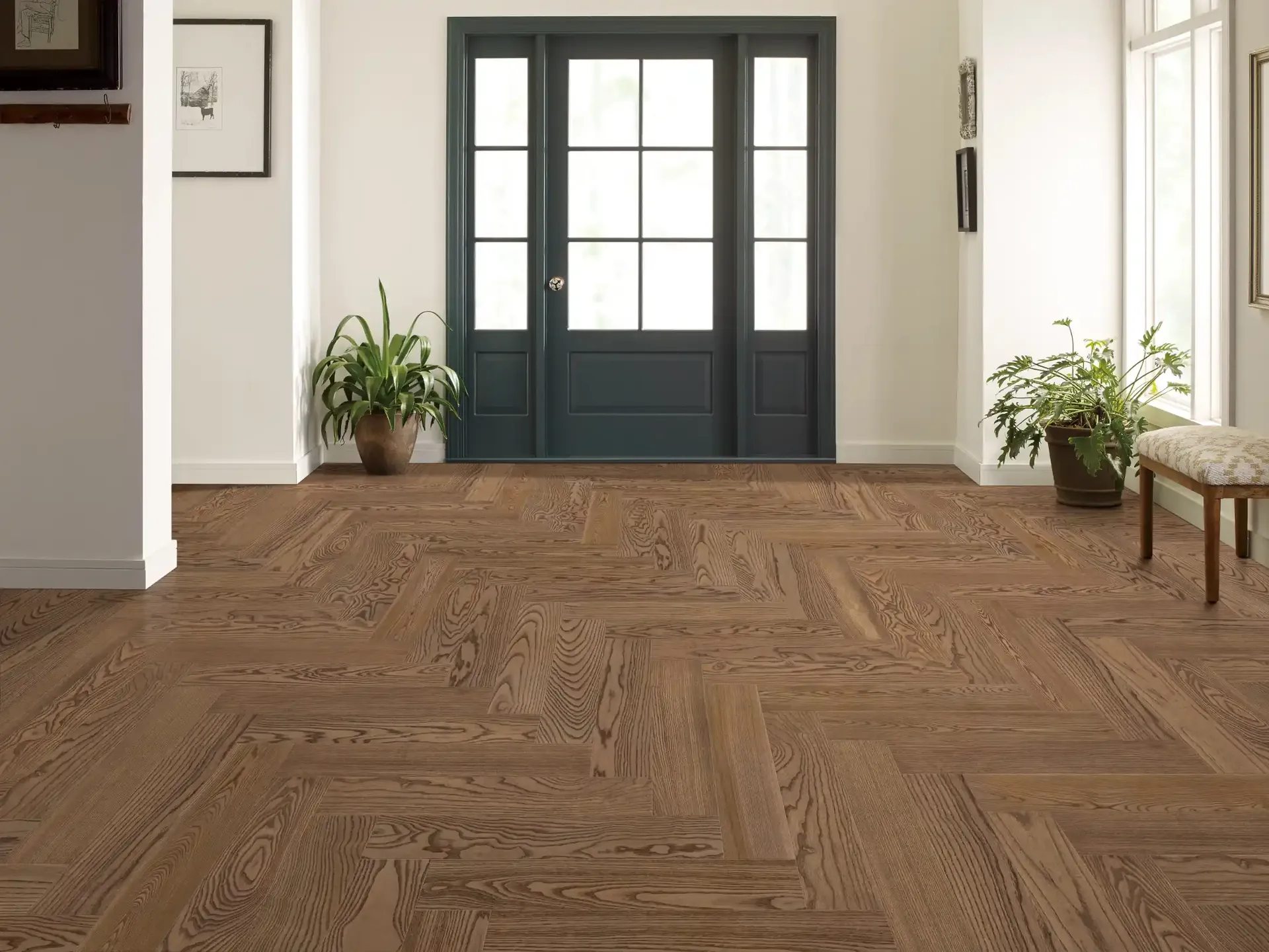 Anderson Tuftex European Ash herringbone hardwood in Biscotti in an entryway. Carried by Blackburn's Interiors, Winter Haven, FL