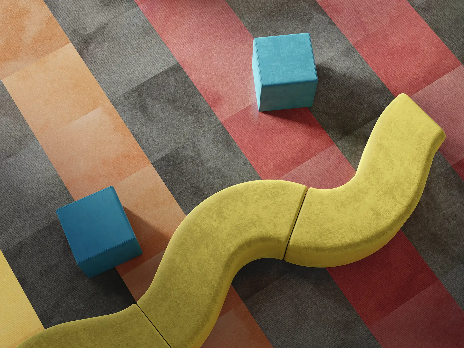 Philadelphia Commercial carpet tile in diagonal orange, red, charcoal and yellow bands in a lounge with a curving yellow bench.
