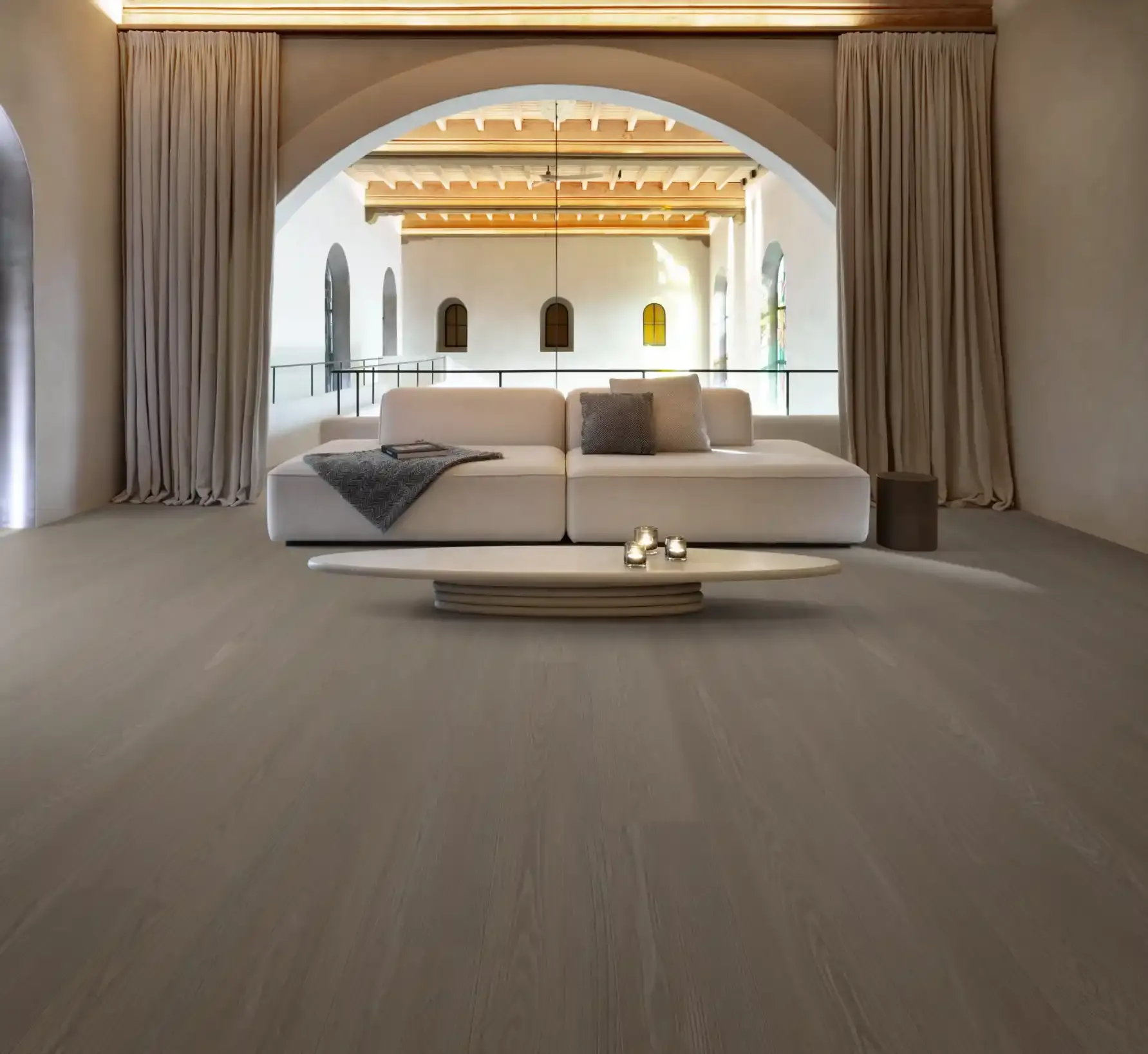 COREtec XL-End long plank in a lounge with a grand archway. Carried by Blackburn's Interiors, Winter Haven, FL