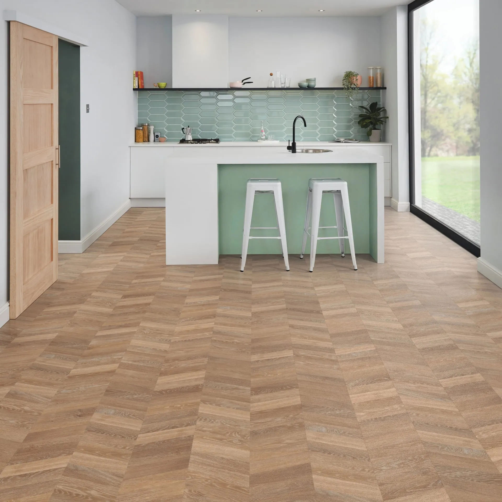 Karndean luxury vinyl in a chevron pattern in a white kitchen. Carried by Blackburn's Interiors, Winter Haven, FL