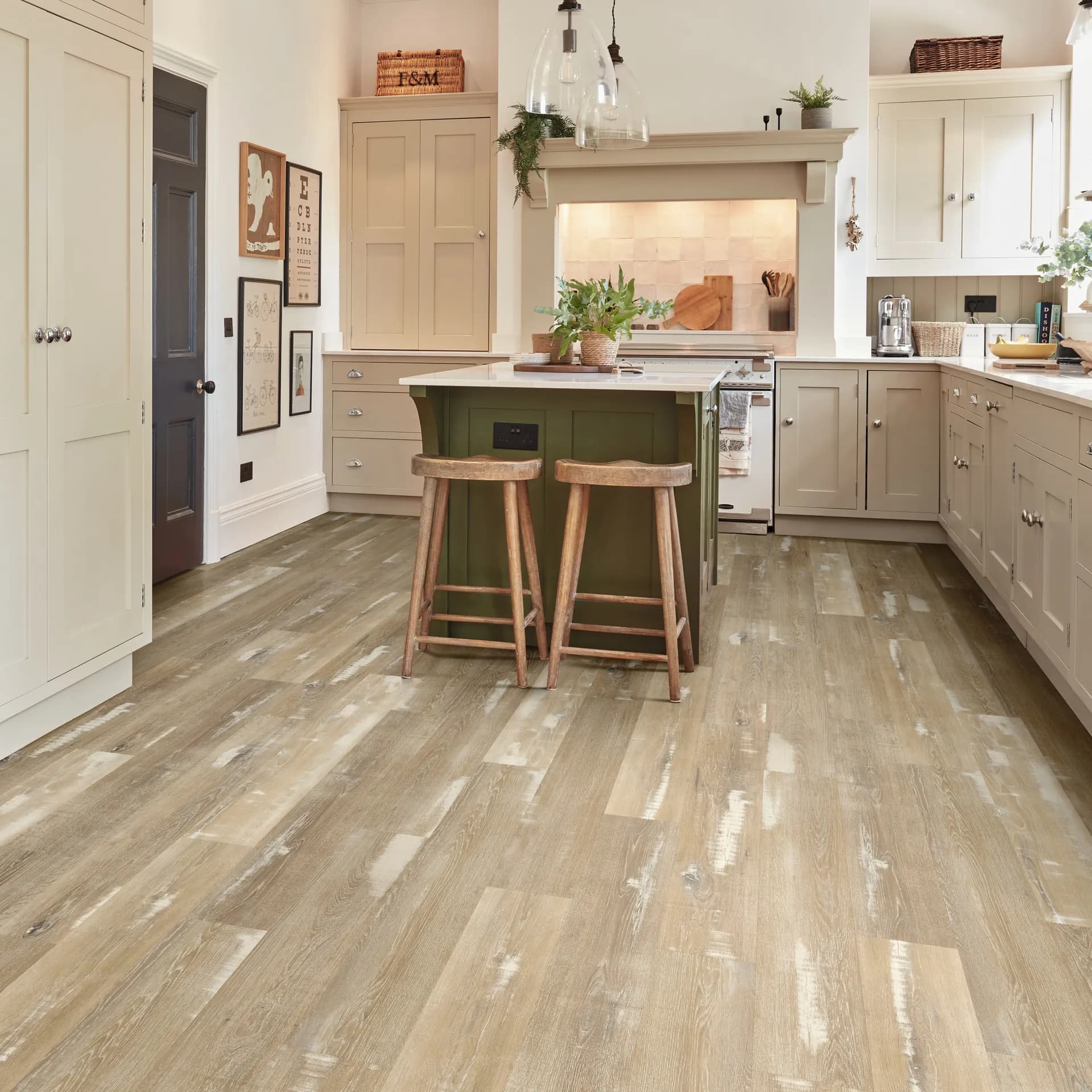 Karndean luxury vinyl in a cream kitchen with a green island. Carried by Blackburn's Interiors, Winter Haven, FL