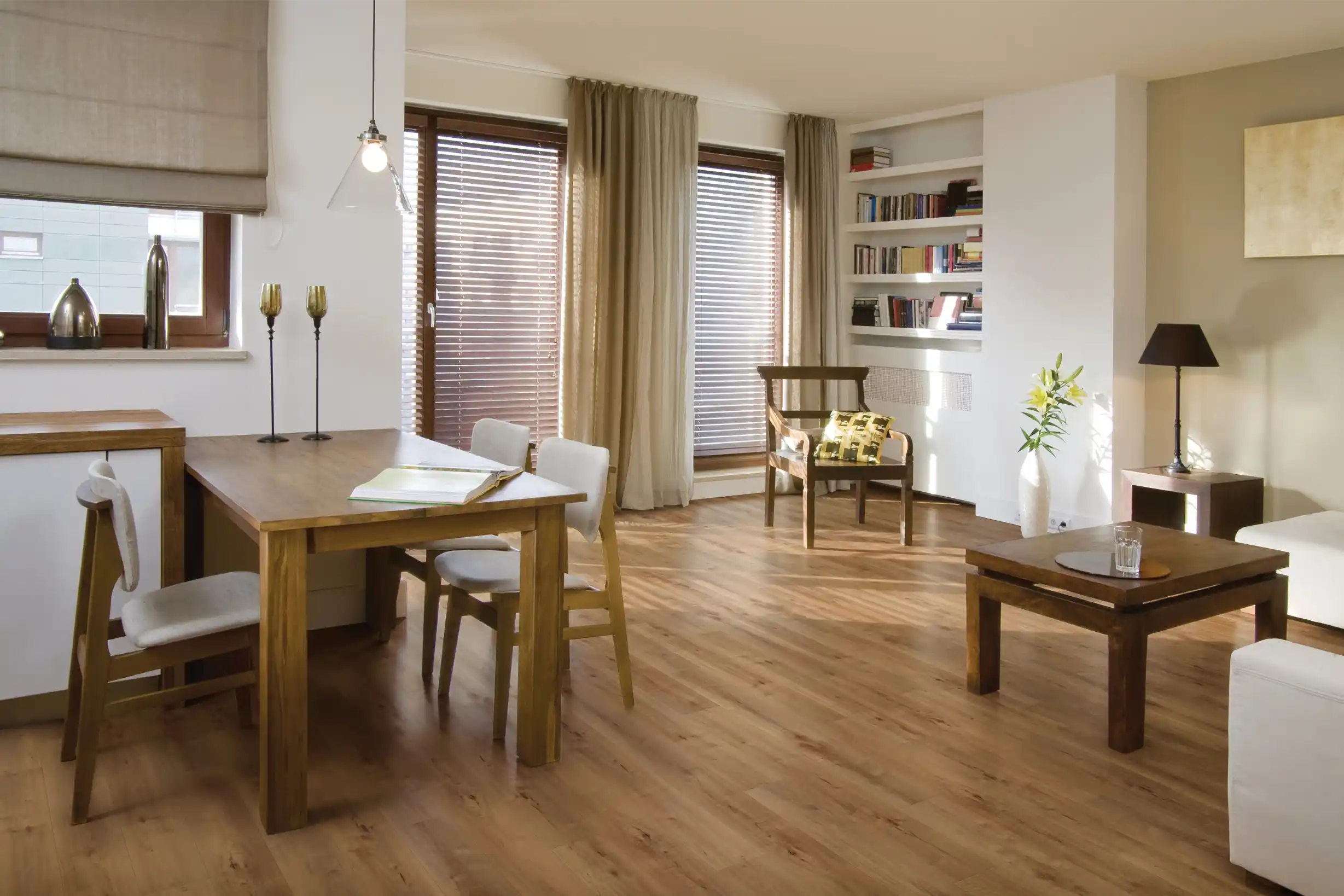 Laminate flooring installed in a Winter Haven, FL home by Blackburn's Interiors, wood-look planks at a friendlier price, family-owned in Polk County since 1962