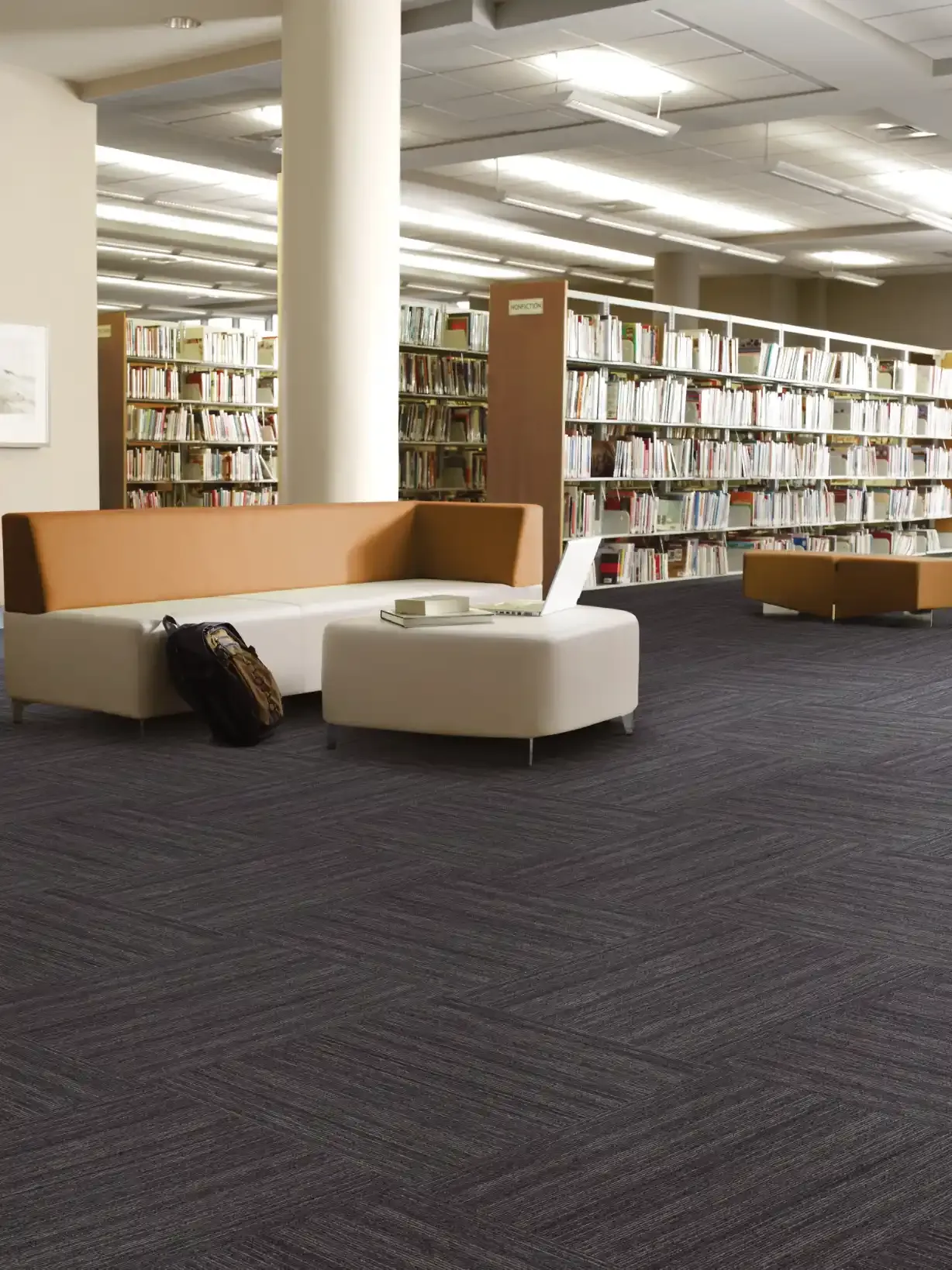 Philadelphia Commercial carpet tile in a public library reading area. Carried by Blackburn's Interiors, Winter Haven, FL