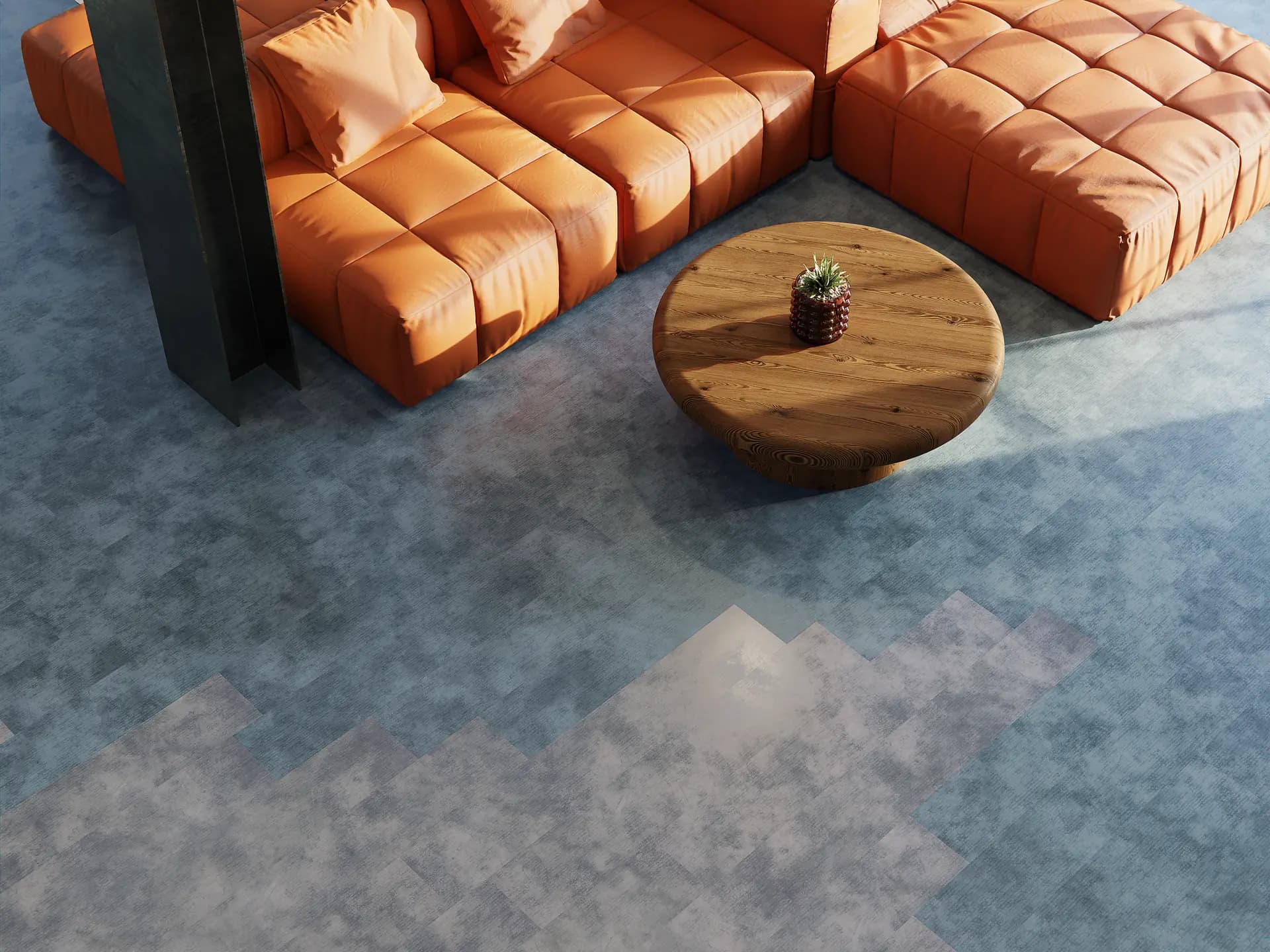 Philadelphia Commercial flooring in blue grey under an orange lounge sofa. Carried by Blackburn's Interiors, Winter Haven, FL