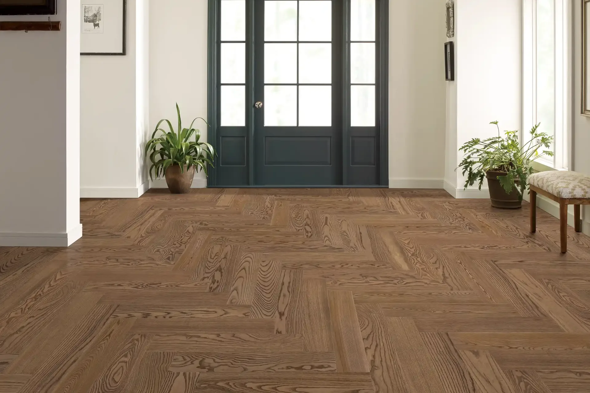 Herringbone hardwood in a bright, easy-to-clean entryway — allergy-friendly flooring, Winter Haven, FL