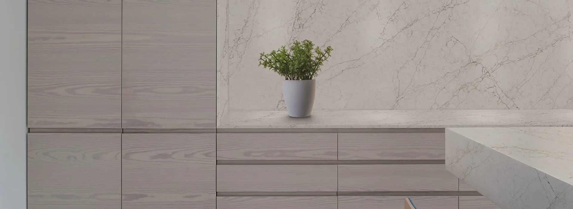 Wilsonart countertops in a white kitchen with a wood-look island top, from the Wilsonart line we carry