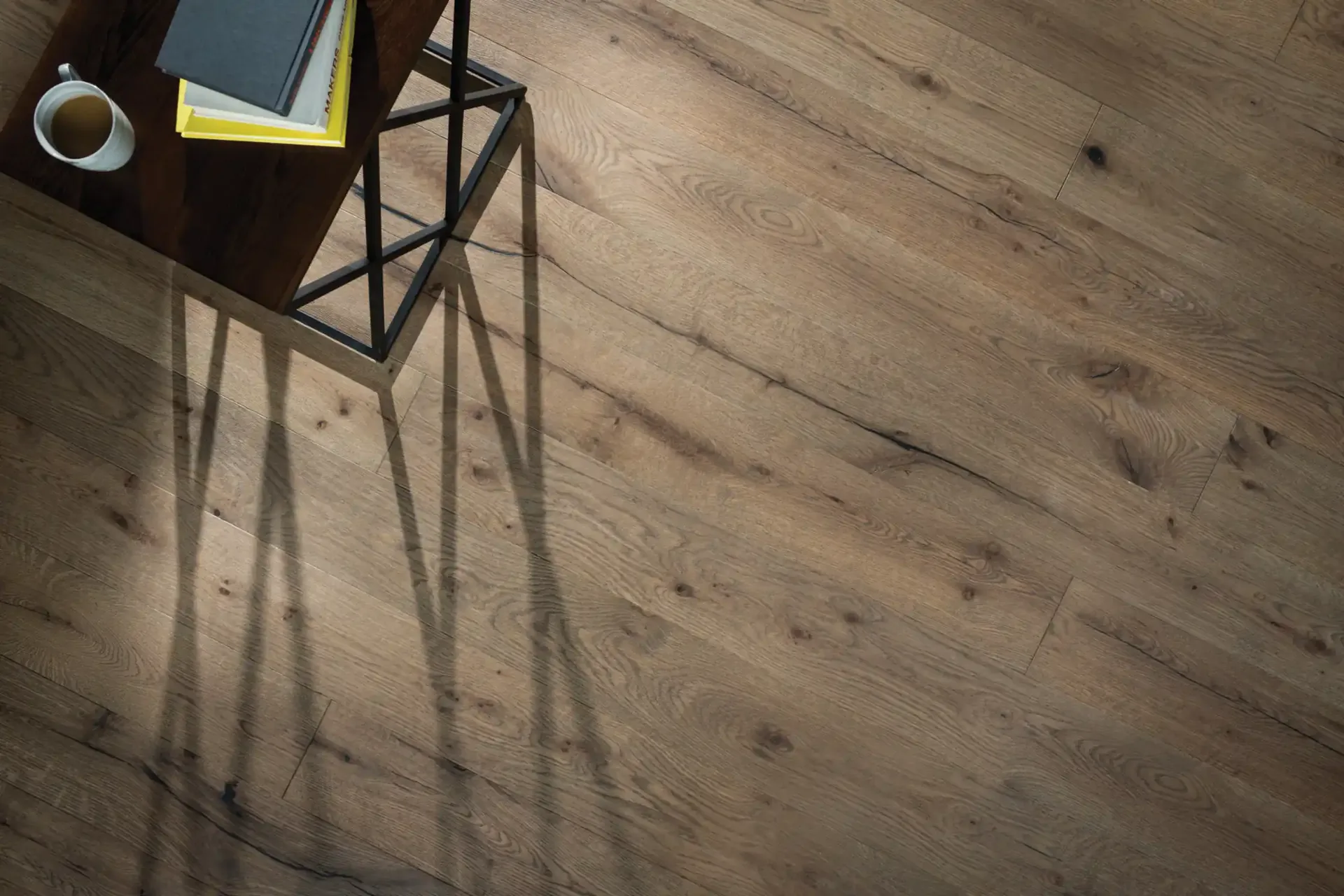 White oak hardwood in a moody study corner — local flooring store quality in Winter Haven, FL