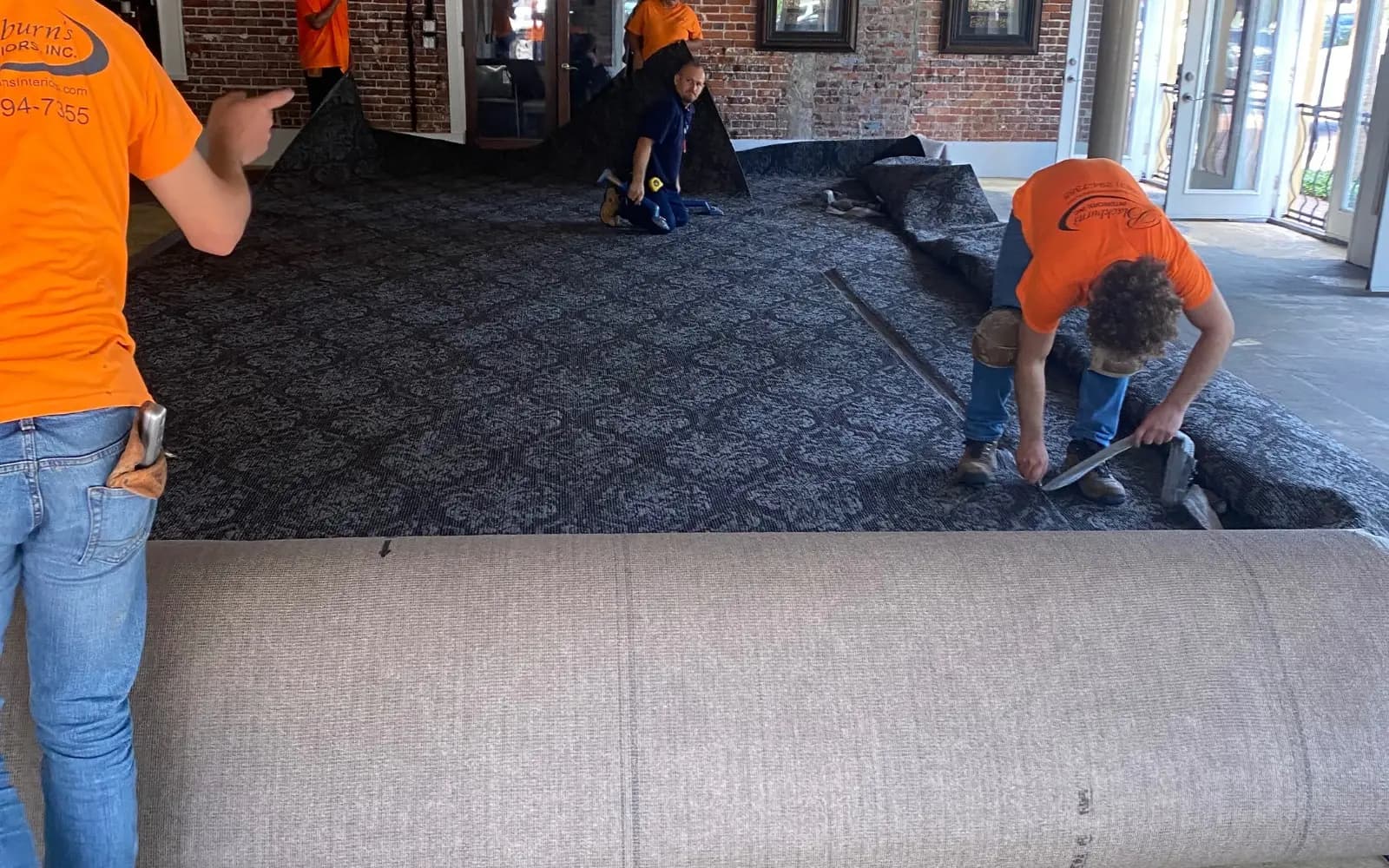 Blackburn's Interiors crew installing new patterned broadloom carpet in the Arabella's Ristorante dining room, Winter Haven, FL